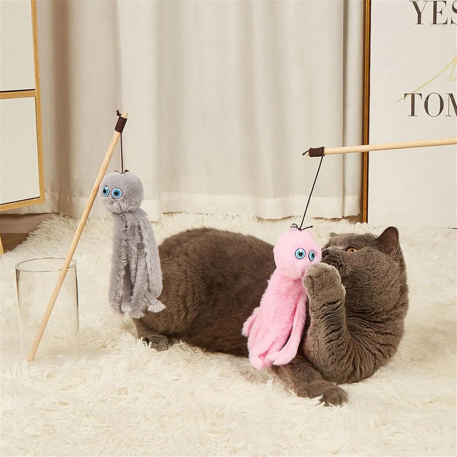Octopus-themed cat toy on a long stick with bright colours, for interactive indoor play with kittens.