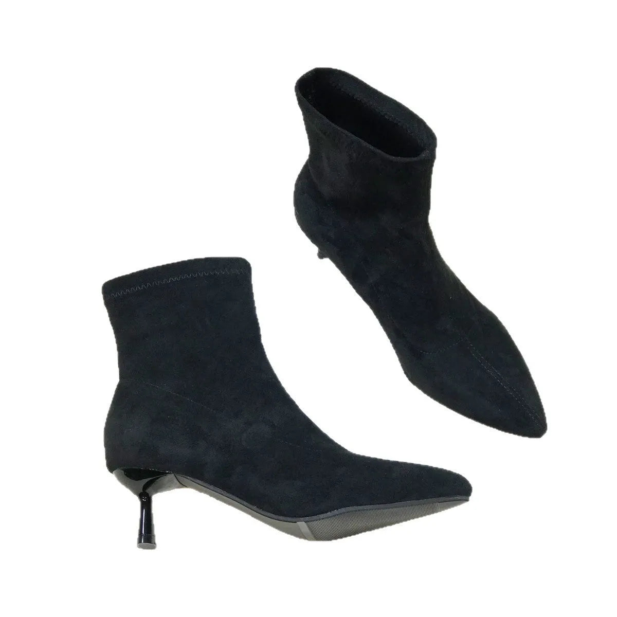 Black pointed toe ankle boots with stiletto heels and mid-calf length