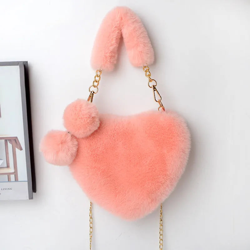 Soft plush heart-shaped women's handbag in medium size with zipper closure
