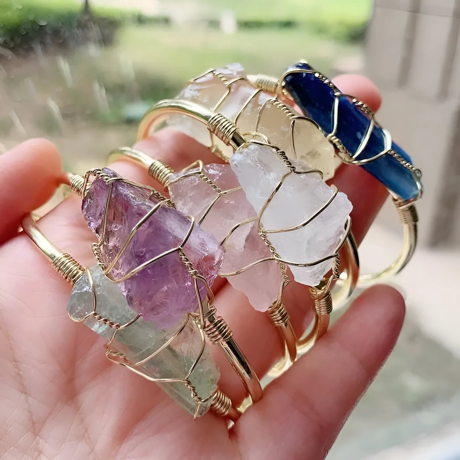 Unshaped natural crystal rough stone bracelet with gold winding geometric design and mixed colour stones
