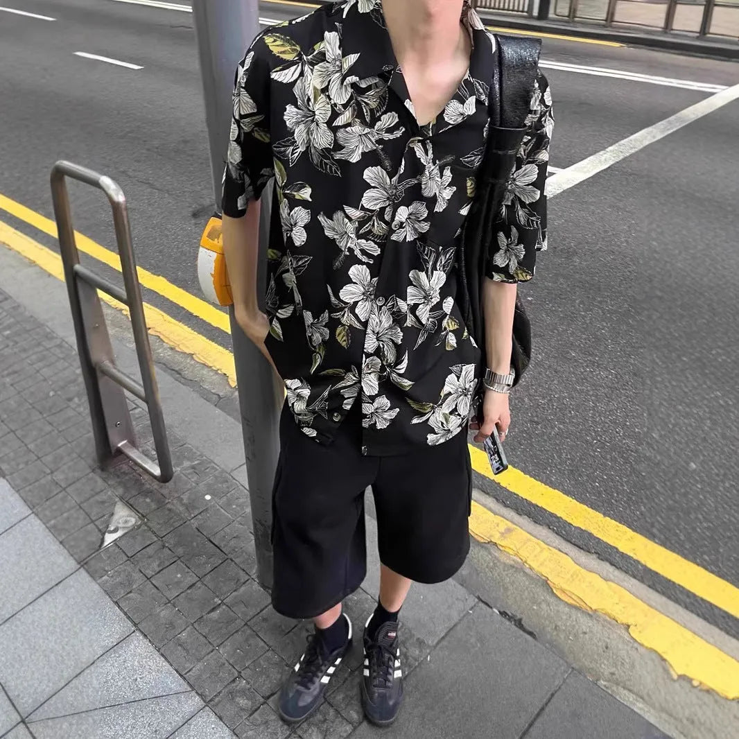 Black men's loose-fit ice silk shirt with vintage Cuban collar, short sleeves, and floral print.