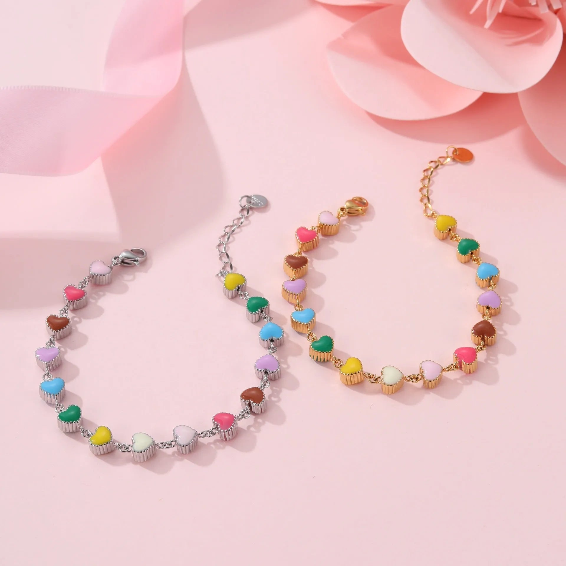Gold or steel coloured heart-shaped titanium steel bracelet with electroplated finish for women's fashion wear