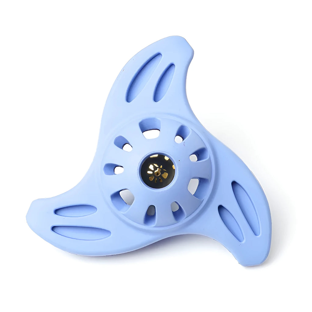 Blue boomerang-shaped rubber chew toy for medium and large dogs on a plain background.
