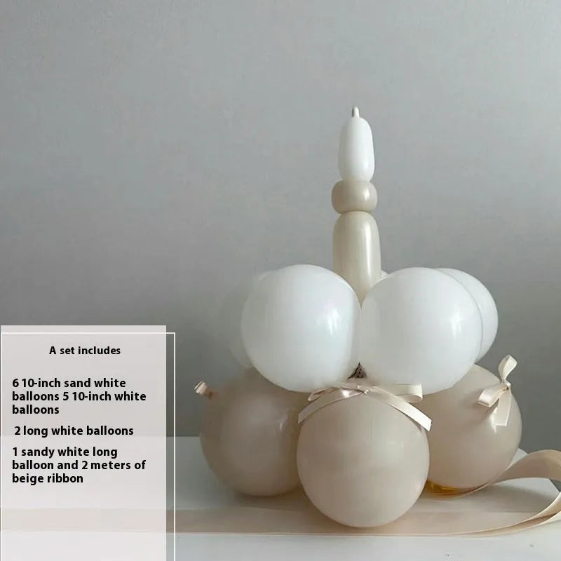 Finished round balloon bouquet decoration for cake table centrepiece.
