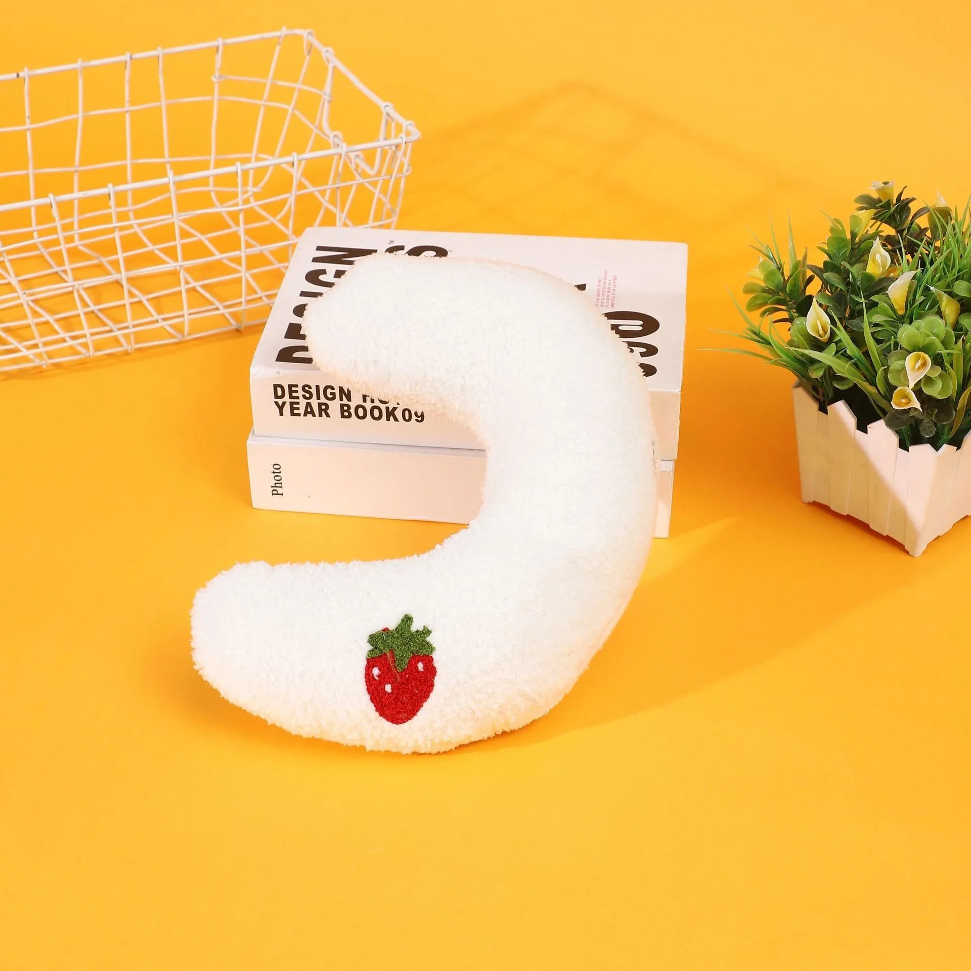 Cartoon half moon shaped U-shaped fabric pillow for cats in blue, pink, white, and yellow colour options