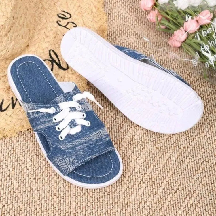 Blue Roman-style women's canvas slippers with rubber sole and cloth lining