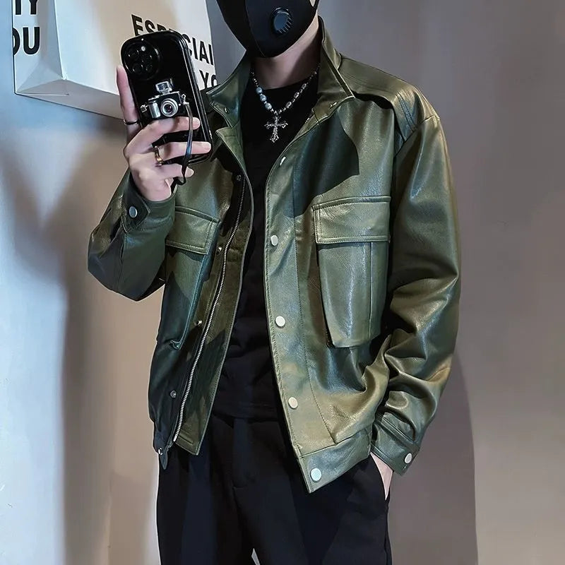 Men's black Korean style PU leather jacket with side pockets on a hanger