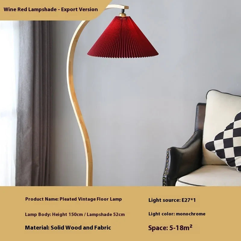 Retro vertical table lamp with fabric shade in white or red, showing three-colour light settings.