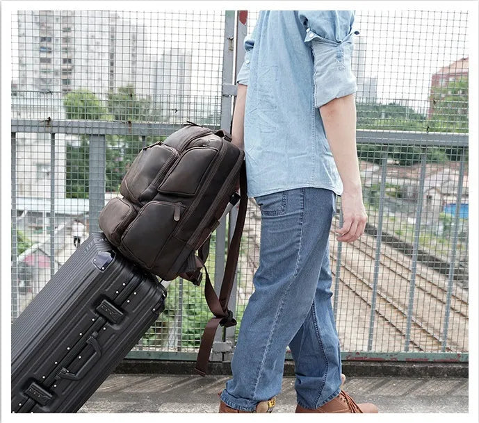 Dark brown men's genuine leather backpack for a 17-inch computer with retro crazy horse texture.