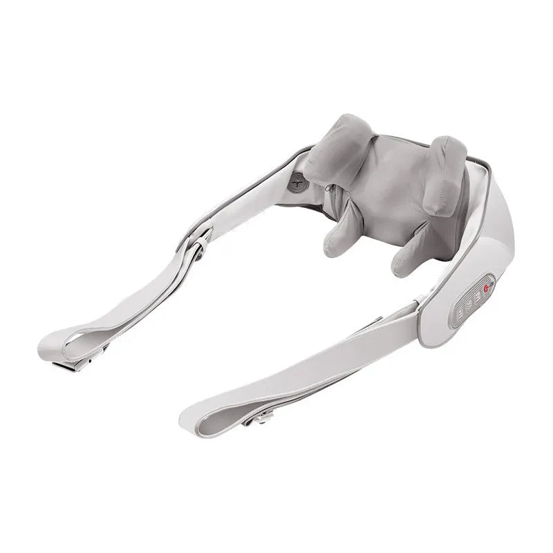 Beige electric shoulder and neck massager with clip-on kneading heads and half PU leather covering on a table