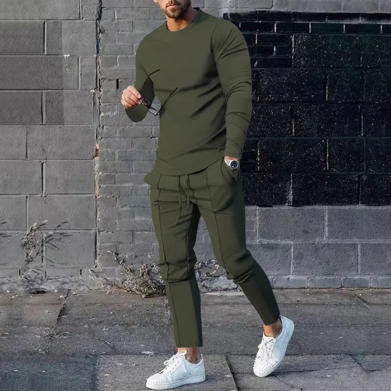 Men's solid colour two-piece polyester tracksuit with long sleeves, shown in apricot colour.