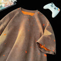 Men's loose fit ripped short sleeve T-shirt in khaki on a grey background