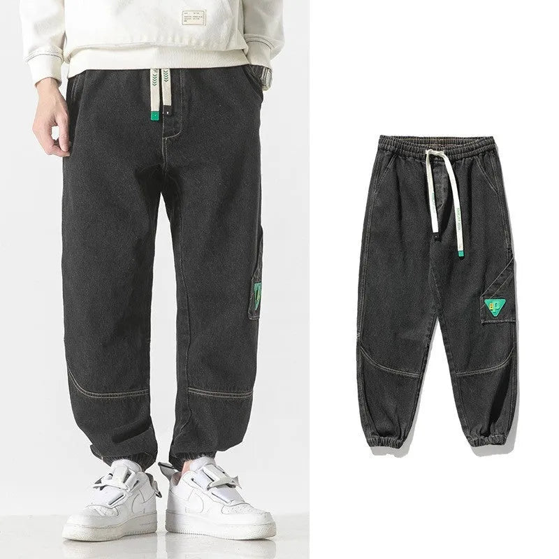 Men's cotton loose-fit tapered trousers in black, blue, or grey with mid-waist design