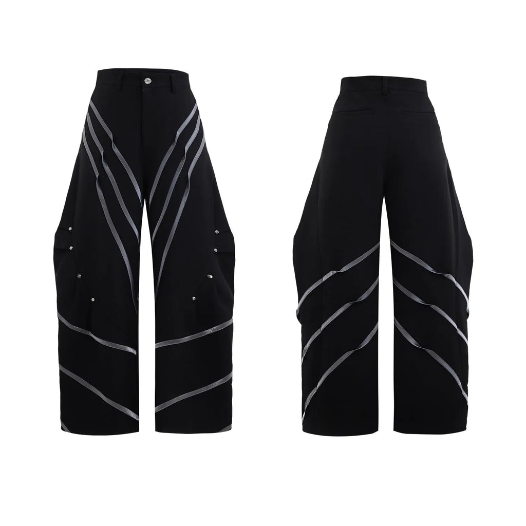 Men's trousers with metal striped rivet pleated design showing three-dimensional cutting detail