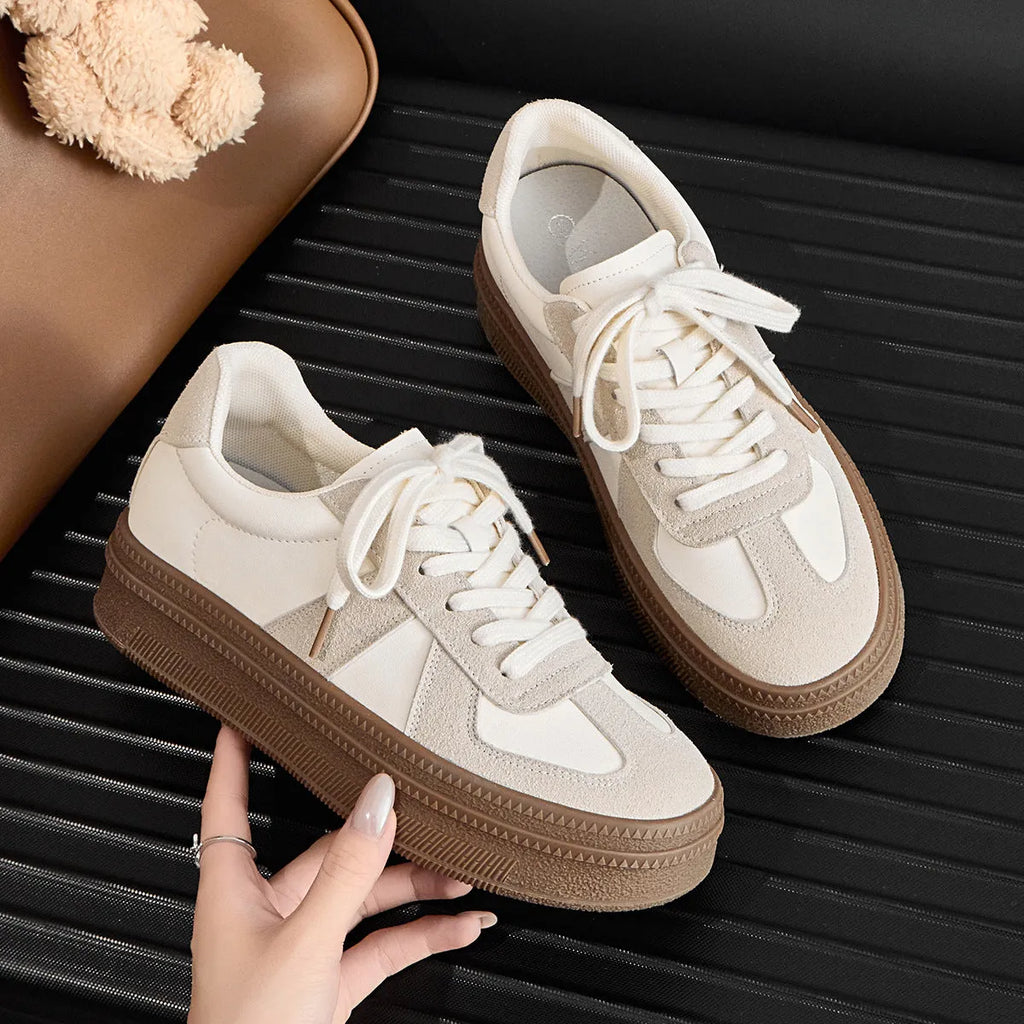 Retro round toe board shoes in matte finish with cross straps and front laces, shown in milky white and silver.