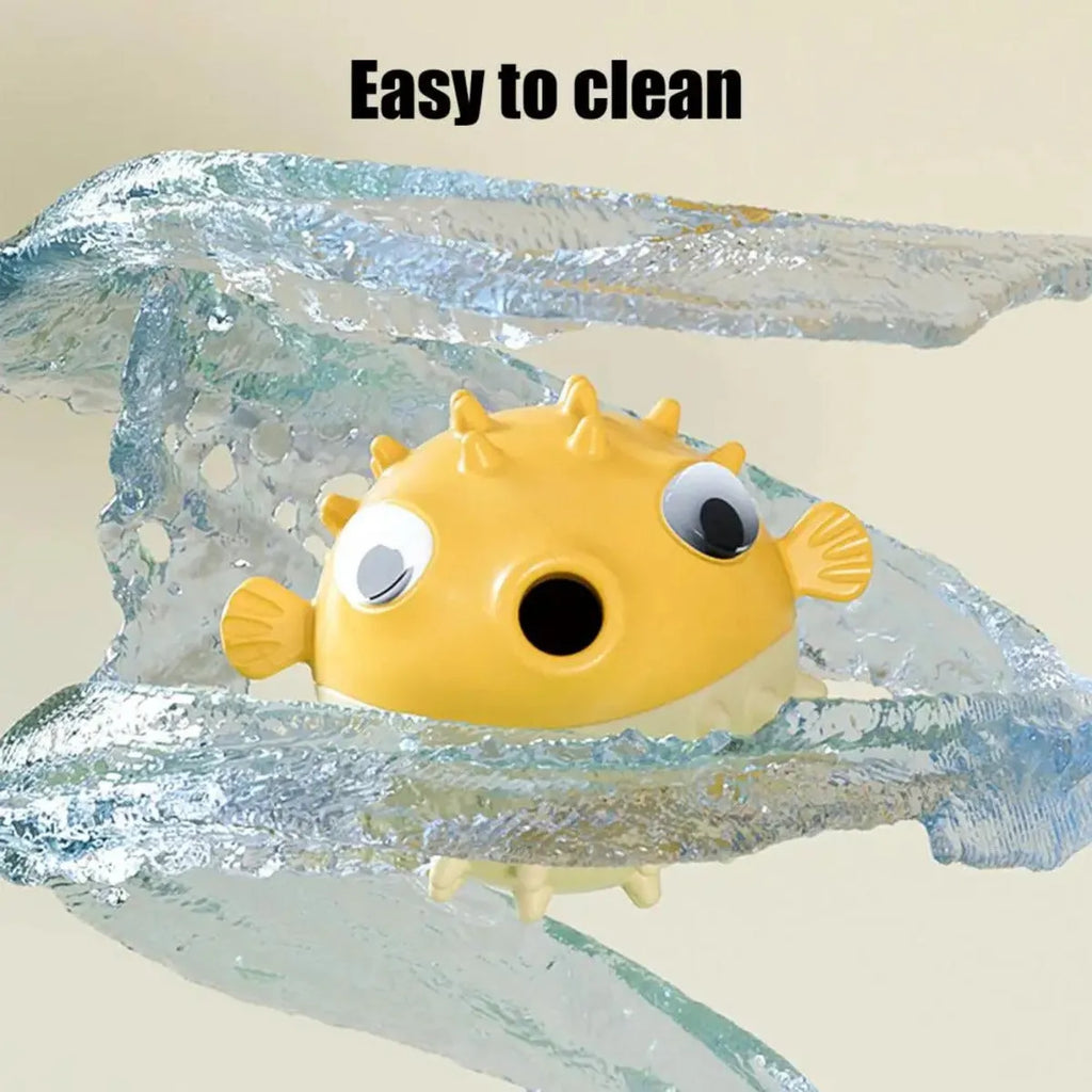 Yellow fish-shaped vinyl dog chew toy with textured surface and squeaker for aggressive chewing dogs