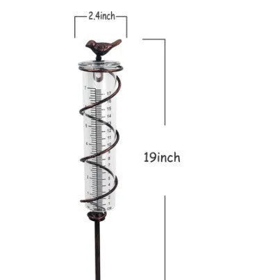 Cast iron garden rain gauge with hummingbird design showing 0-800ml water capacity