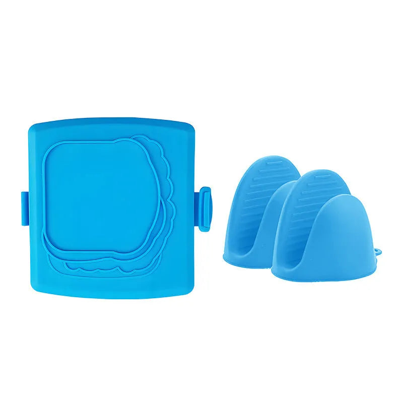 Red silicone baking tray with hand clamp attachment showing anti-scald design