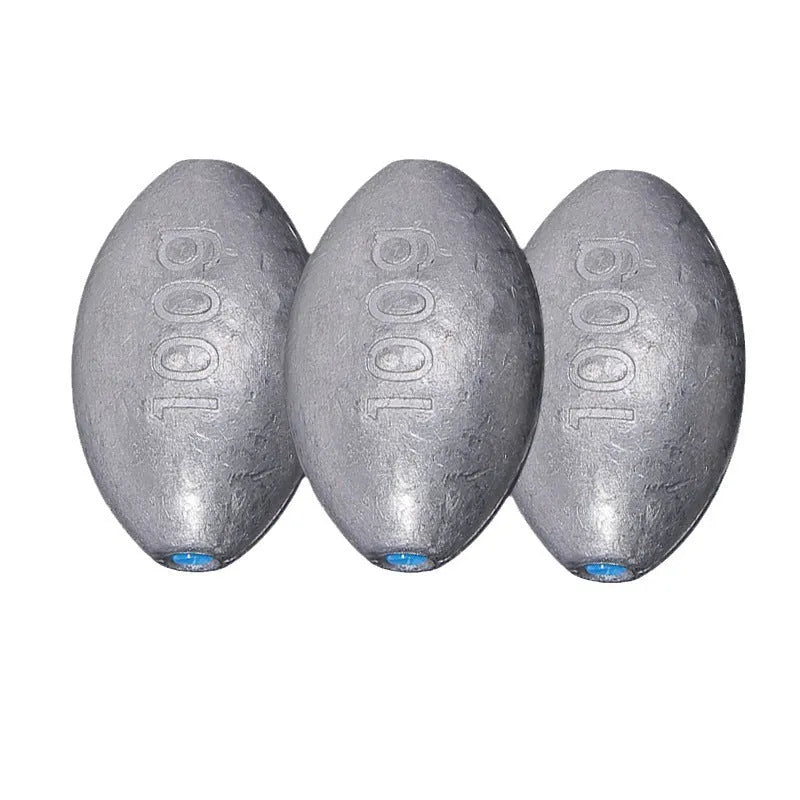 Tongxin olive-shaped rugby lead sinker for sea fishing with scale texture, showing plastic core construction.