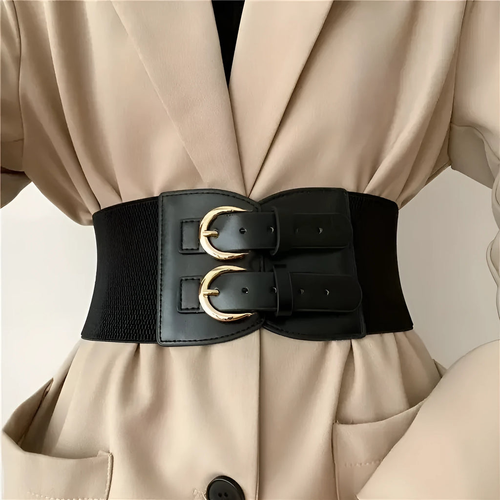 Women's black synthetic leather wide waistband with single loop on a plain background showing elastic construction