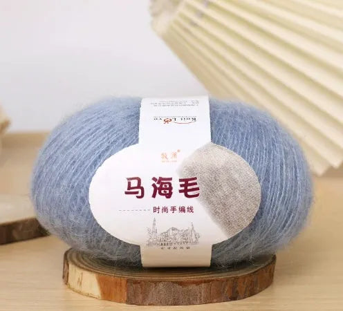 Mohair wool ball for DIY scarf knitting in assorted colours on white background