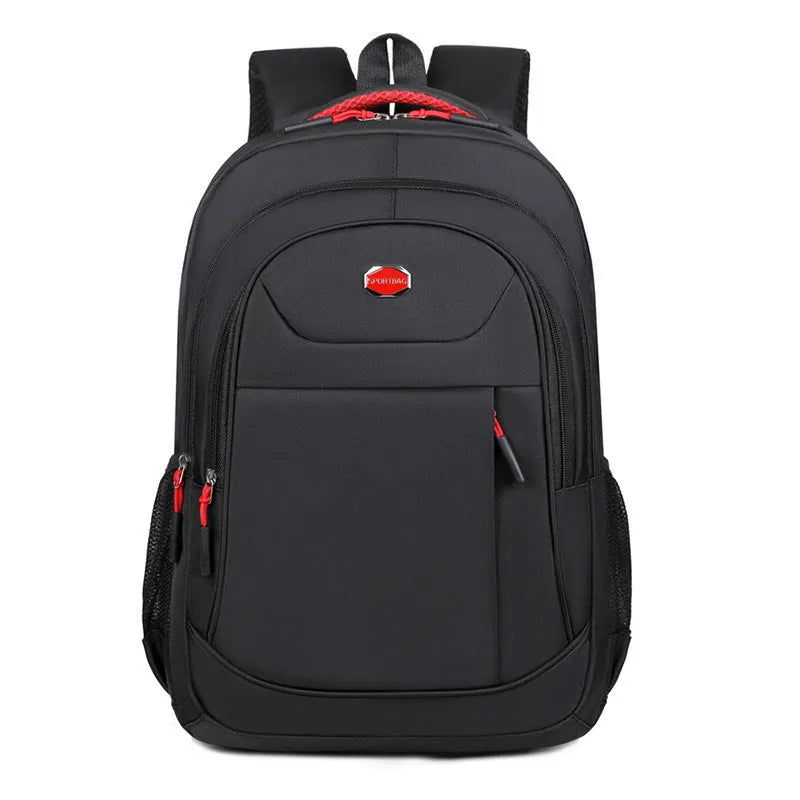 Oxford cloth college backpack in solid colour with multi-layer compartments and curved shoulder straps.