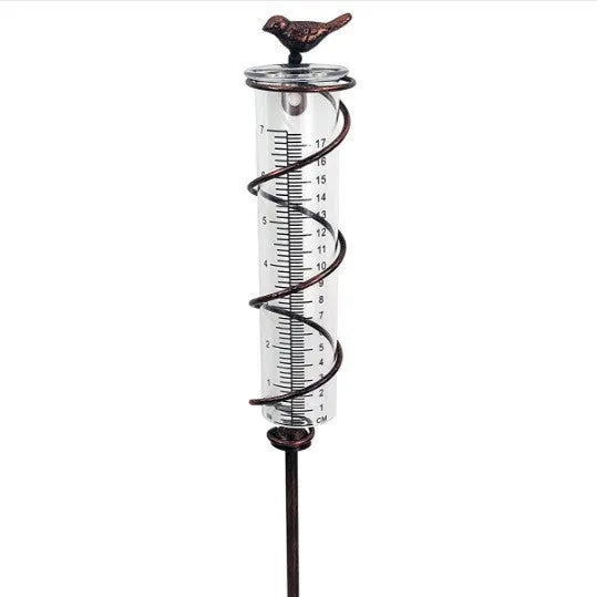 Cast iron garden rain gauge with hummingbird design showing 0-800ml water capacity