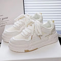 Children's board shoes with thick rubber sole, synthetic leather upper, and cross shoulder straps in beige.