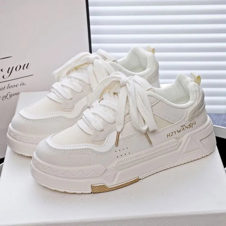 Children's board shoes with thick rubber sole, synthetic leather upper, and cross shoulder straps in beige.