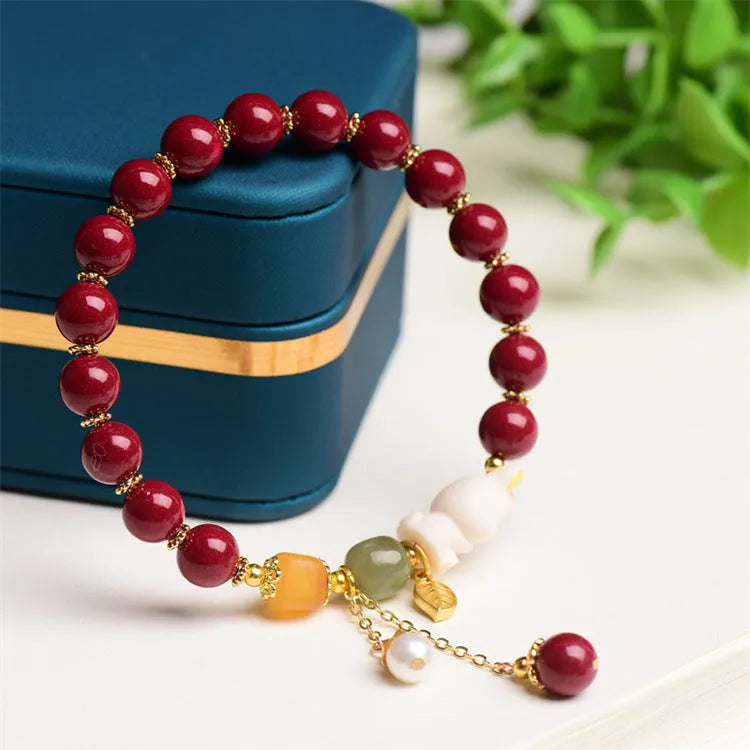 Traditional Chinese cinnabar bracelet with rabbit design, available in 8mm and 10mm bead sizes.
