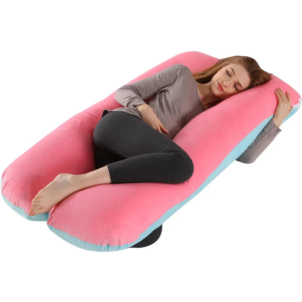 Large U-shaped pregnancy support pillow with removable cover in choice of fabrics.