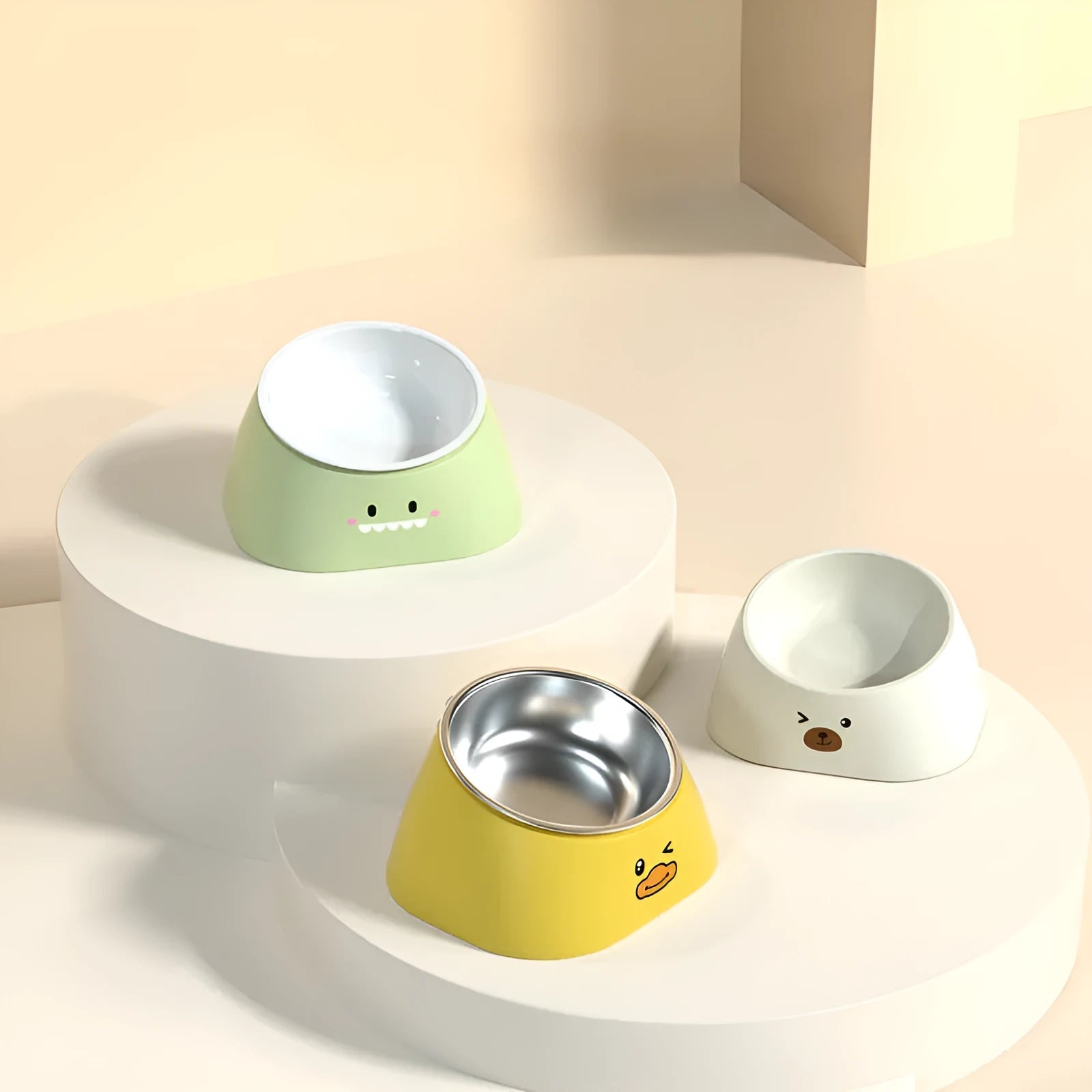 Green elevated pet feeding bowl with tilted stainless steel insert and wide anti-slip base.
