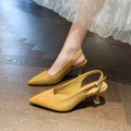 Women's apricot suede pointed-toe stiletto high heel shoe with a rubber sole