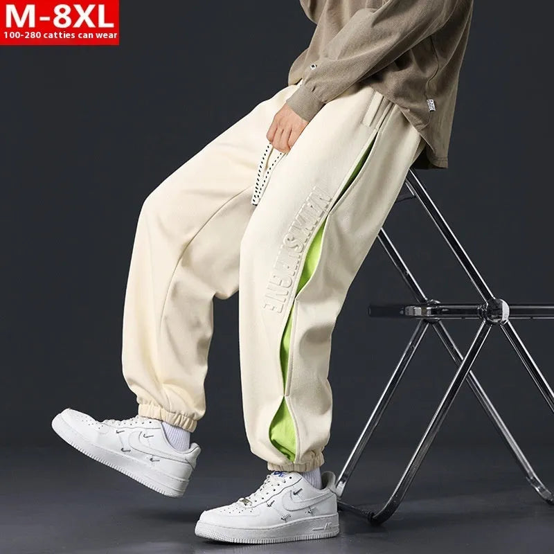 Men's loose fit ankle banded trousers with stitching detail in various colours