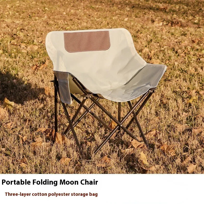 Beige folding camping chair with steel frame and Oxford cloth seat in open position