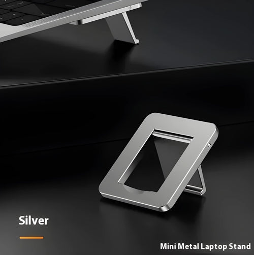 Aluminium alloy foldable laptop bracket showing compact folded size and silver colour
