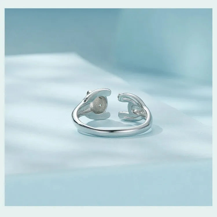 Adjustable sterling silver open ring with white gold plating and a detailed panda design.