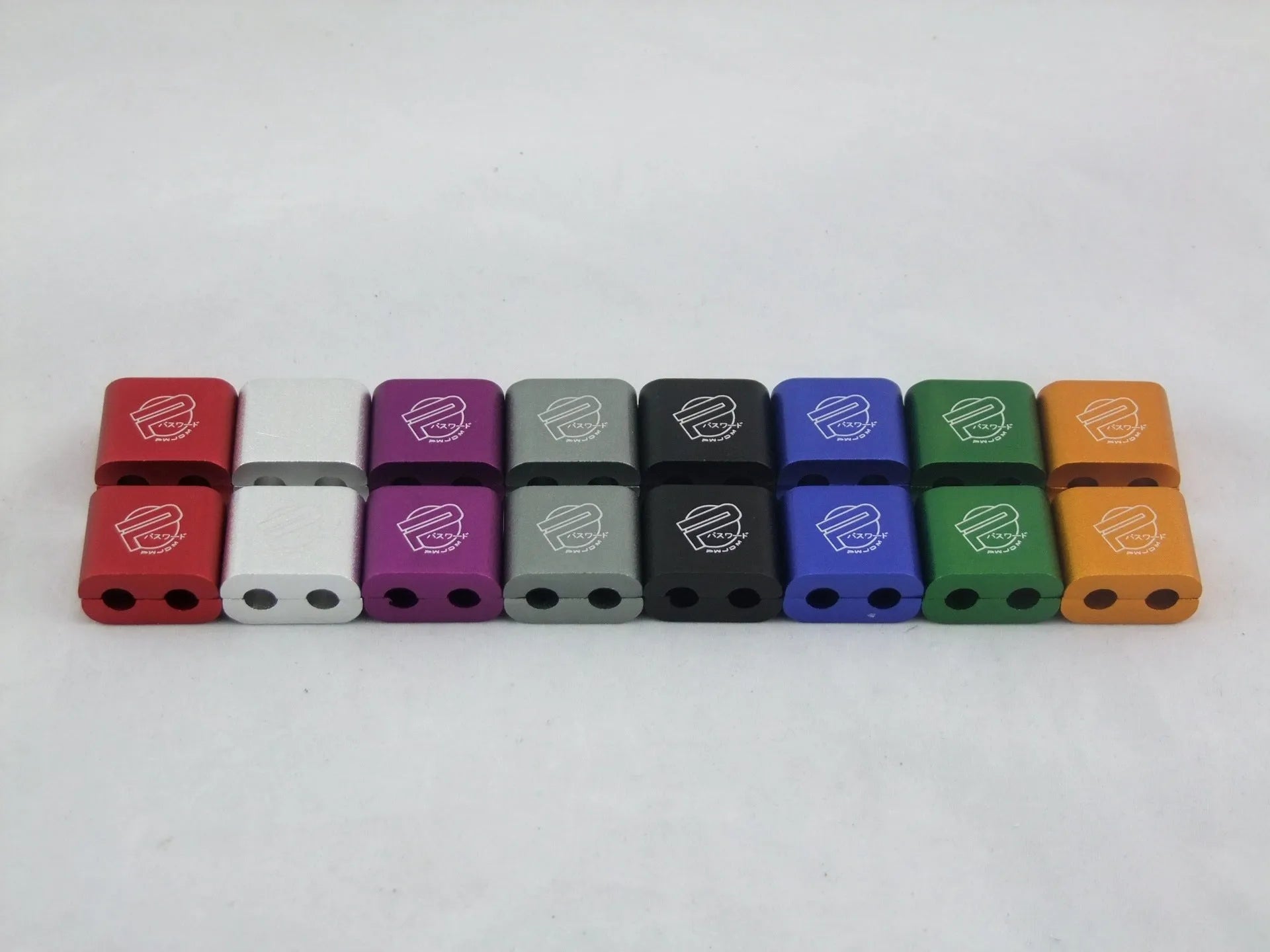 Three-piece metal car fastening clamp set in six colour options on a grey background.