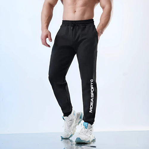 Men's black ankle-tied sweatpants with mid waist design and adjustable leg closures