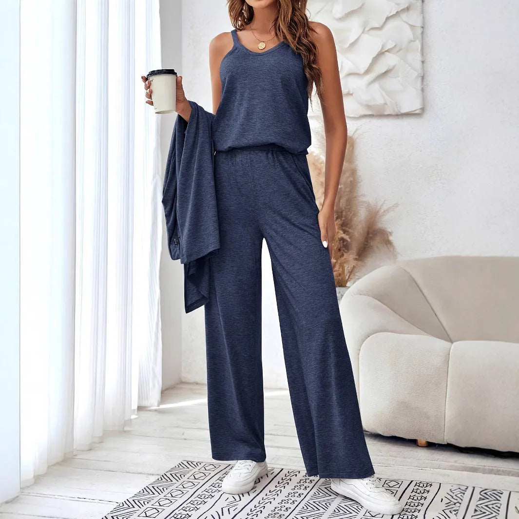Blue women's casual two-piece set with sling top, cardigan trousers, and suspenders on a hanger.