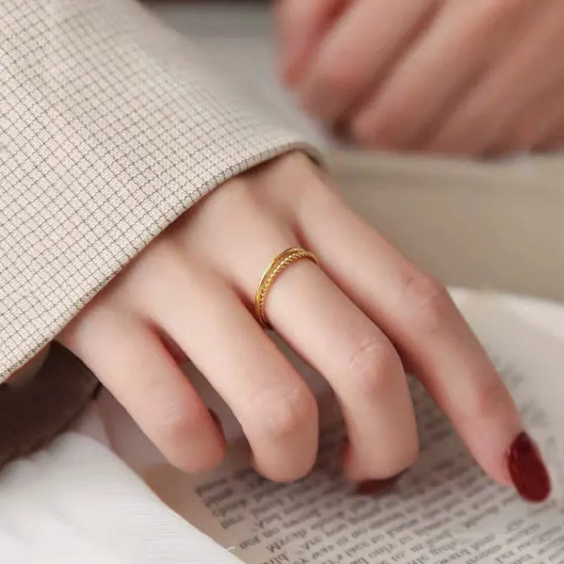 Women's brass gold plated ring showing twist, simple bracelet matte, and simple bracelet glossy styles