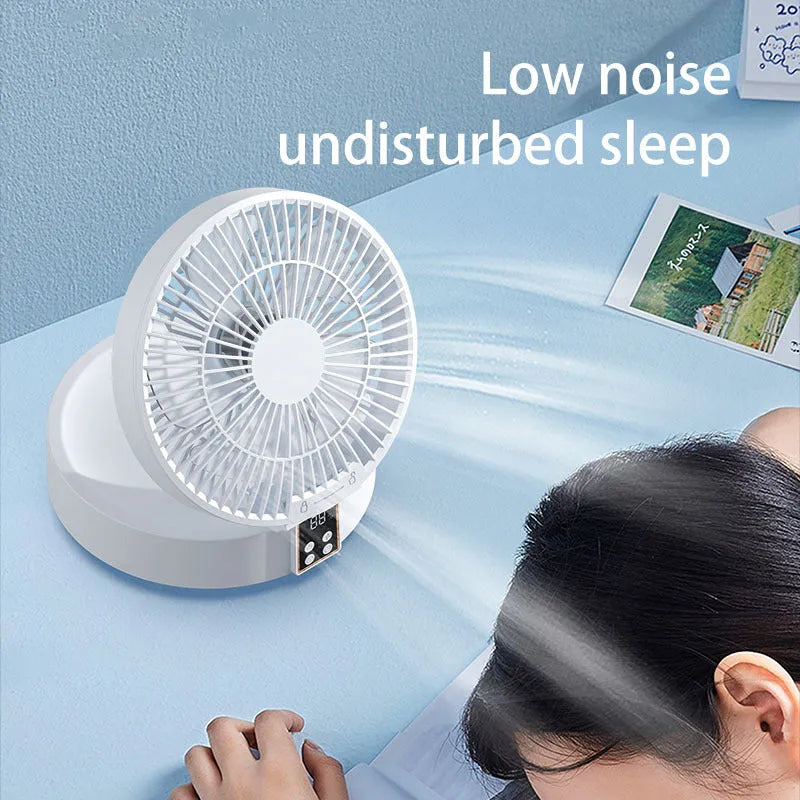White portable electric fan with remote control showing folded design and night light function
