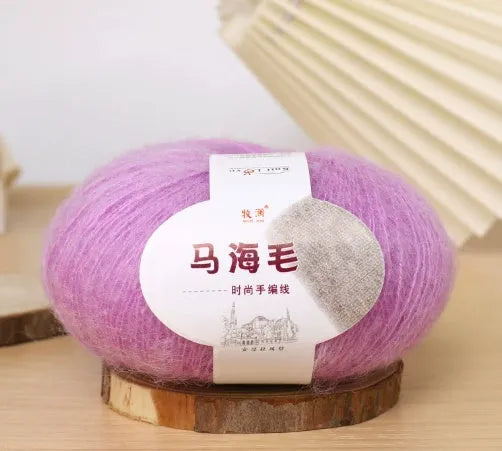 Mohair wool ball for DIY scarf knitting in assorted colours on white background
