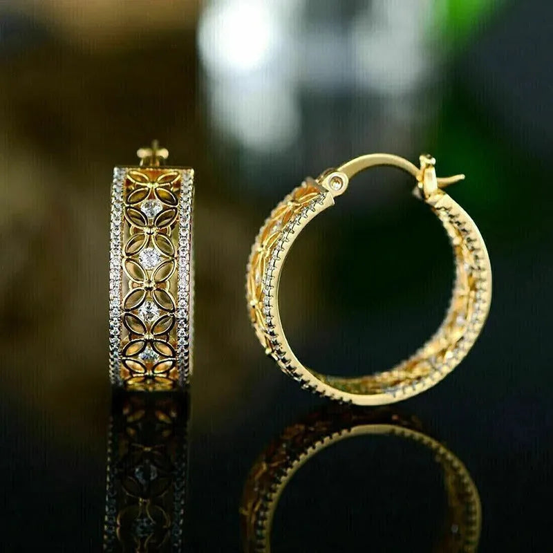 Yellow gold geometric horse eye ear clips with floral butterfly design for women