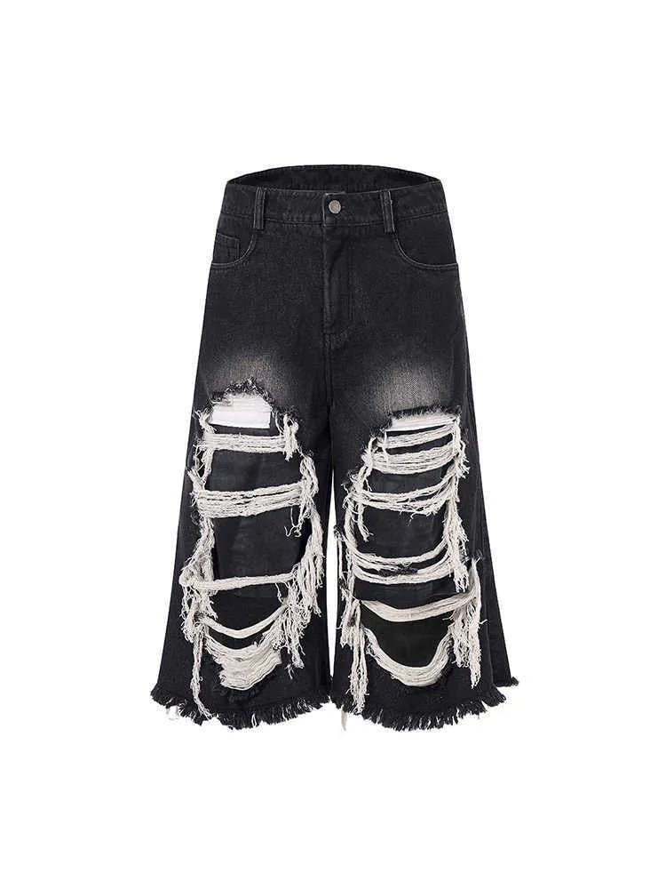 Black women's cropped wide-leg jeans with a mid-high waist and loose fit