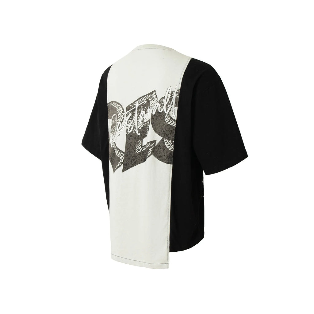 Black and white deconstruction printed loose fit cotton blend t-shirt on hanger.
