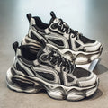 Men's black mesh sneakers with a cross strap and platform rubber sole.