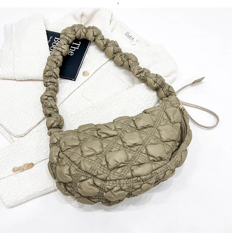 Women's nylon shoulder messenger bag in a solid colour with a long strap, showing front view.