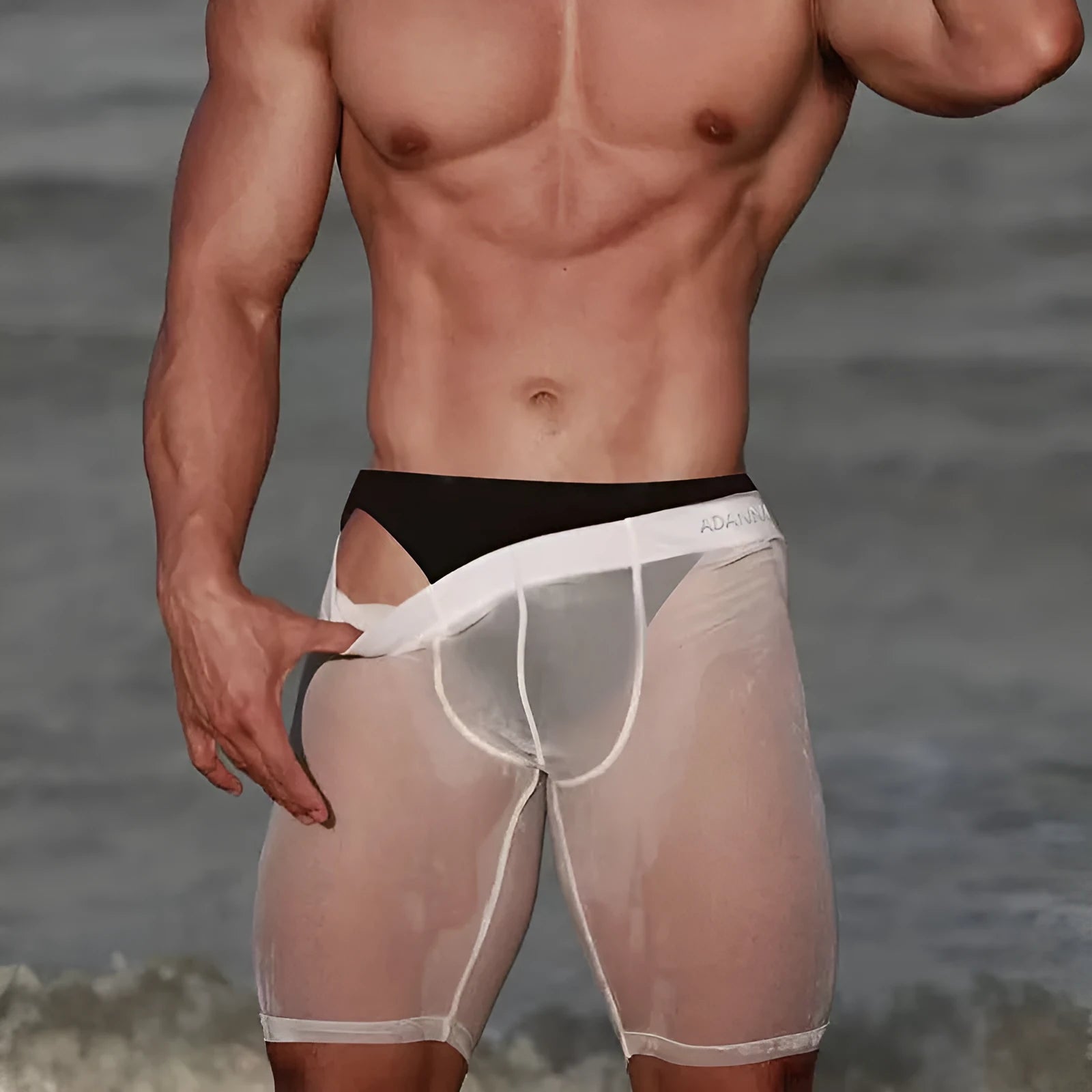 Men's black mesh shorts with seamless construction and hip lifting design