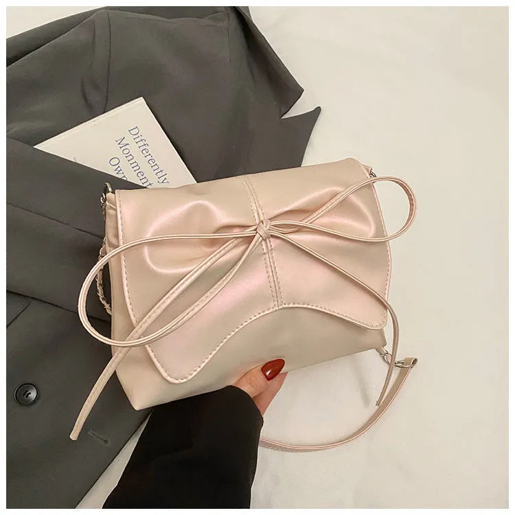 Women's black PU leather crossbody underarm bag with horizontal square shape and sewing line detail